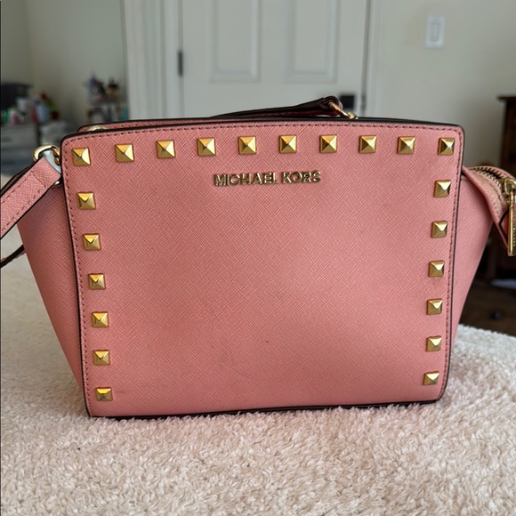 Michael Kors Handbags - Michael Kors Pink and Gold Crossbody Bag with Studded Details